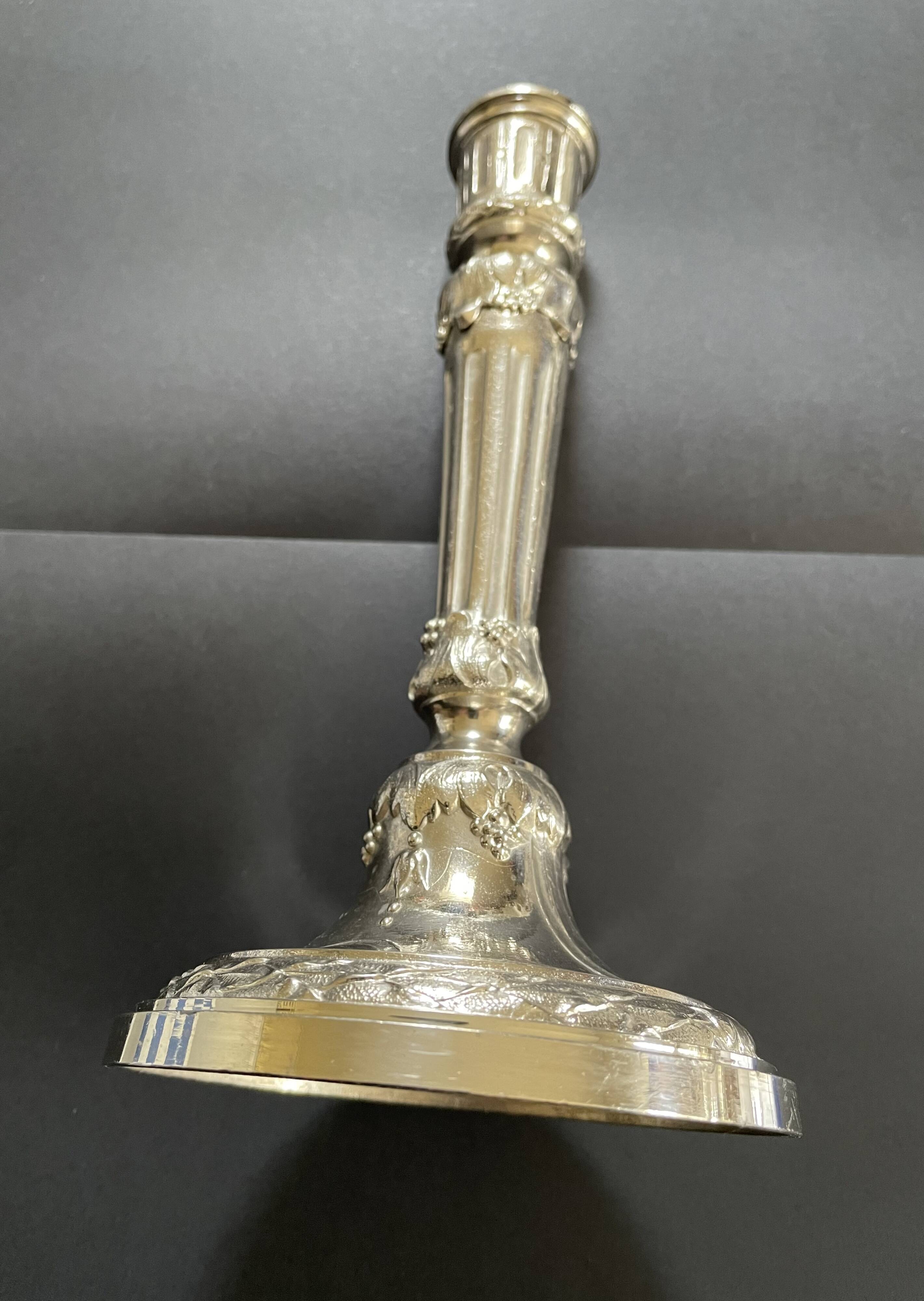 Antique silver-plated candlesticks in classic style