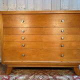 Vintage 1950s oak commode with tapered legs.