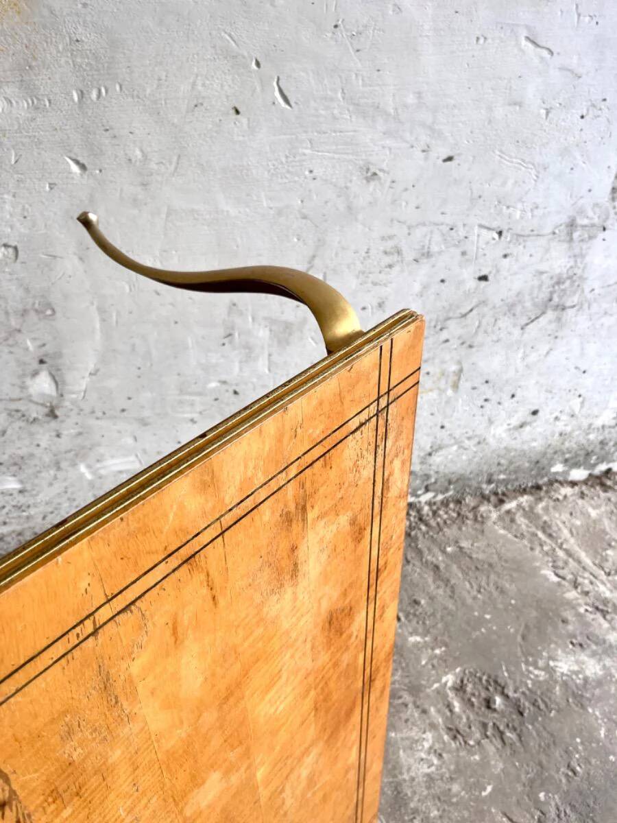 Mid-century wooden coffee table with golden metal legs and black-lined tabletop, 1950s