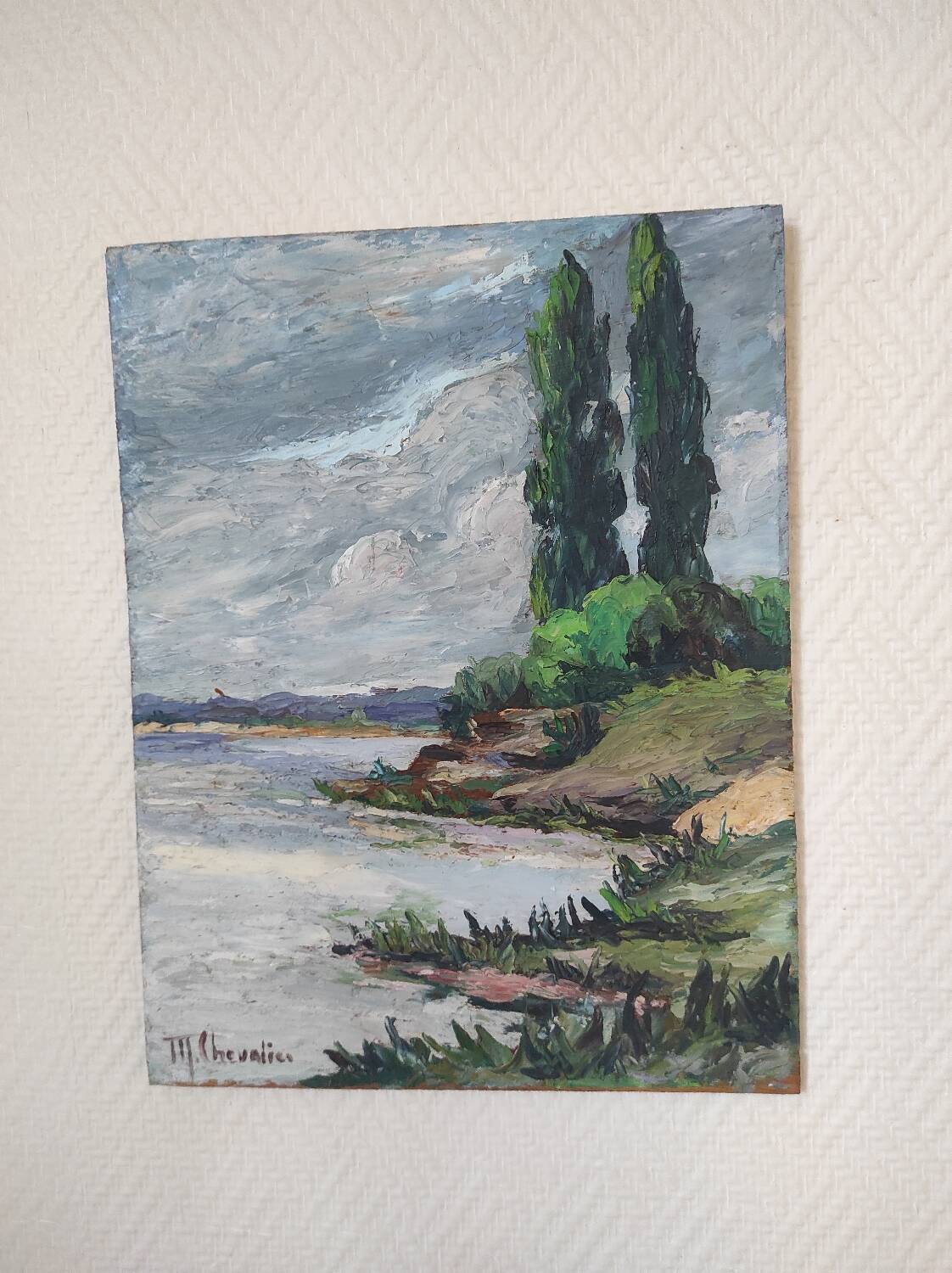 Riverside landscape painting (signed Chevalier)