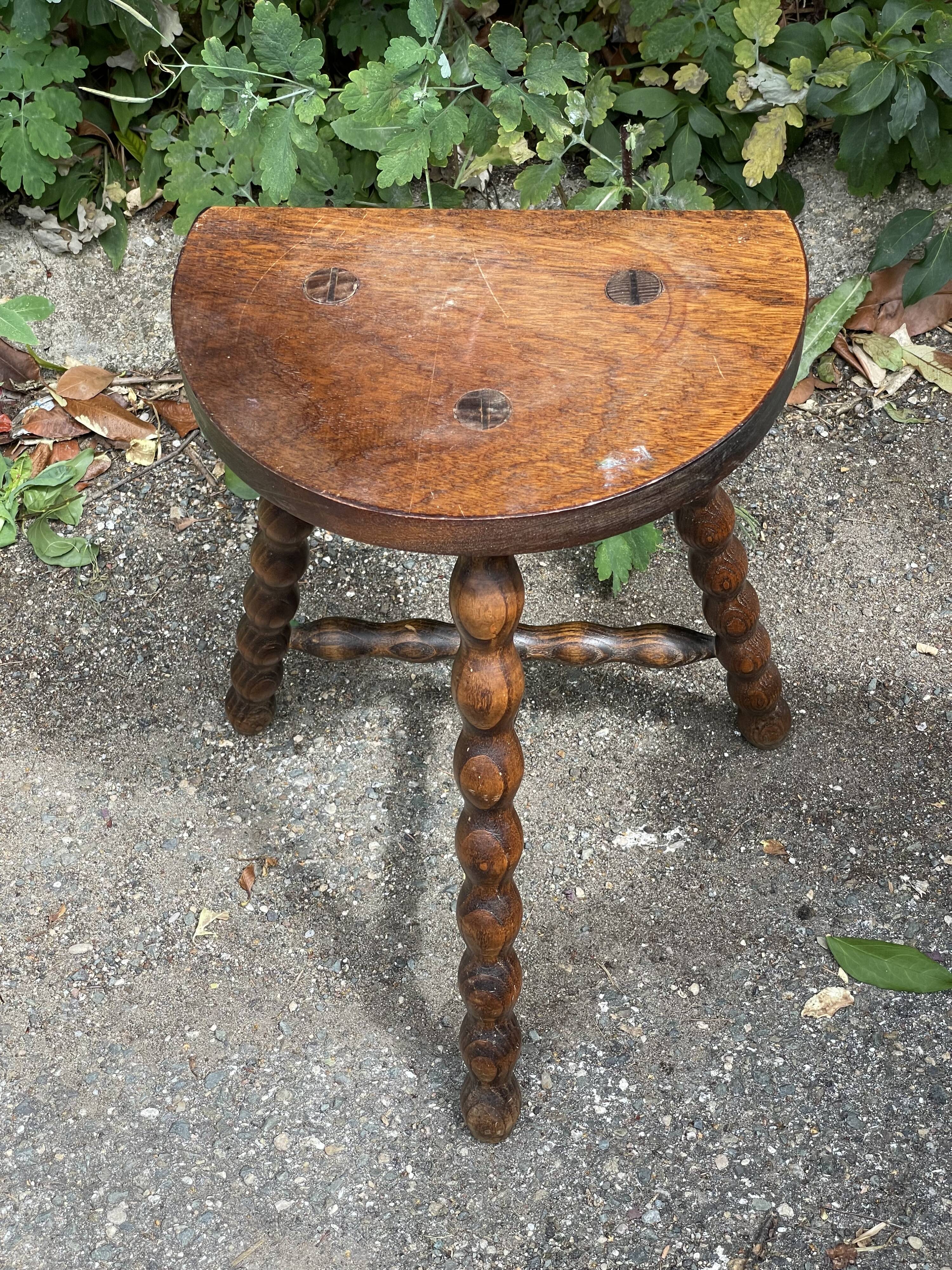 Wooden tripod stool