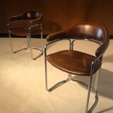 Pair of vintage armchairs, cognac leather and chrome steel 1970