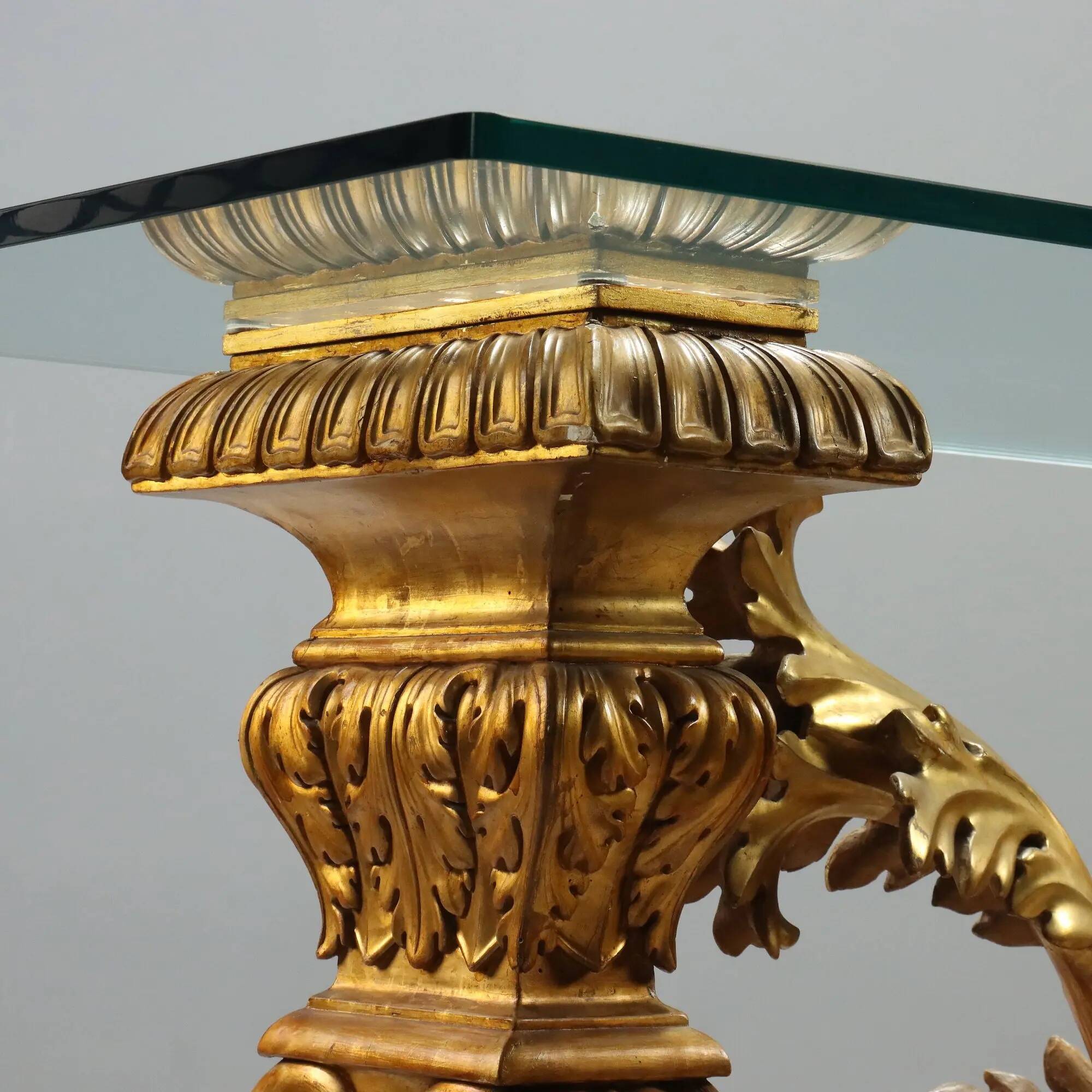 Antique coffee table in gilded wood with a glass top, Italy, 20th century.