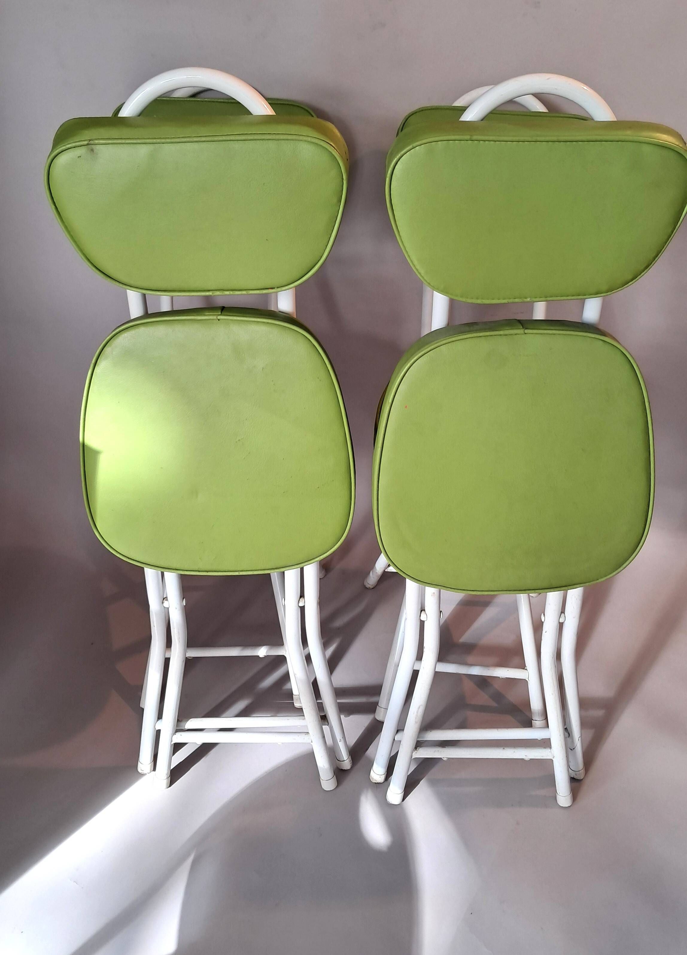 Set of 4 folding cocktail chairs in olive green faux leather from the 1970s.