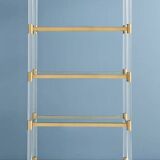 Lucite bookshelf with polished brass-plated stainless steel accents