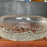 Set of three round thick moulded glass candle holders