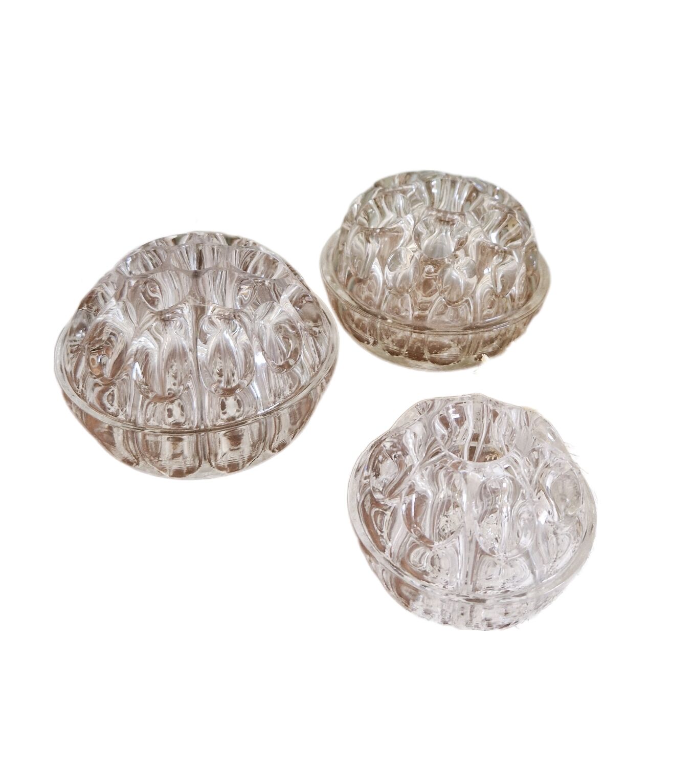 Set of three vintage flowers in transparent molded glass