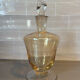 Carafe vintage en verre avec bouchon sculpté