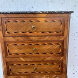 Small chest of drawers of Louis XVI style in veneer wood