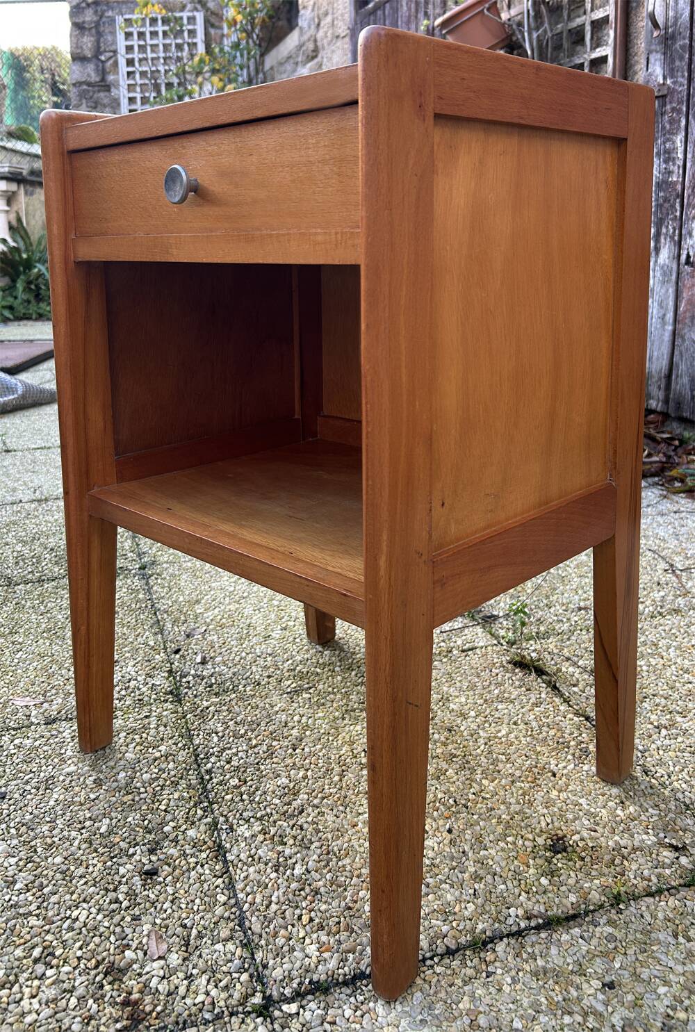 Wooden bedside table, warm tones, vintage, 1950s.