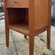 Wooden bedside table, warm tones, vintage, 1950s.