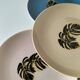 Set of 7 porcelain plates, gold foliage & jungle