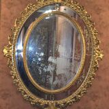 Miroir ovale en bois doré