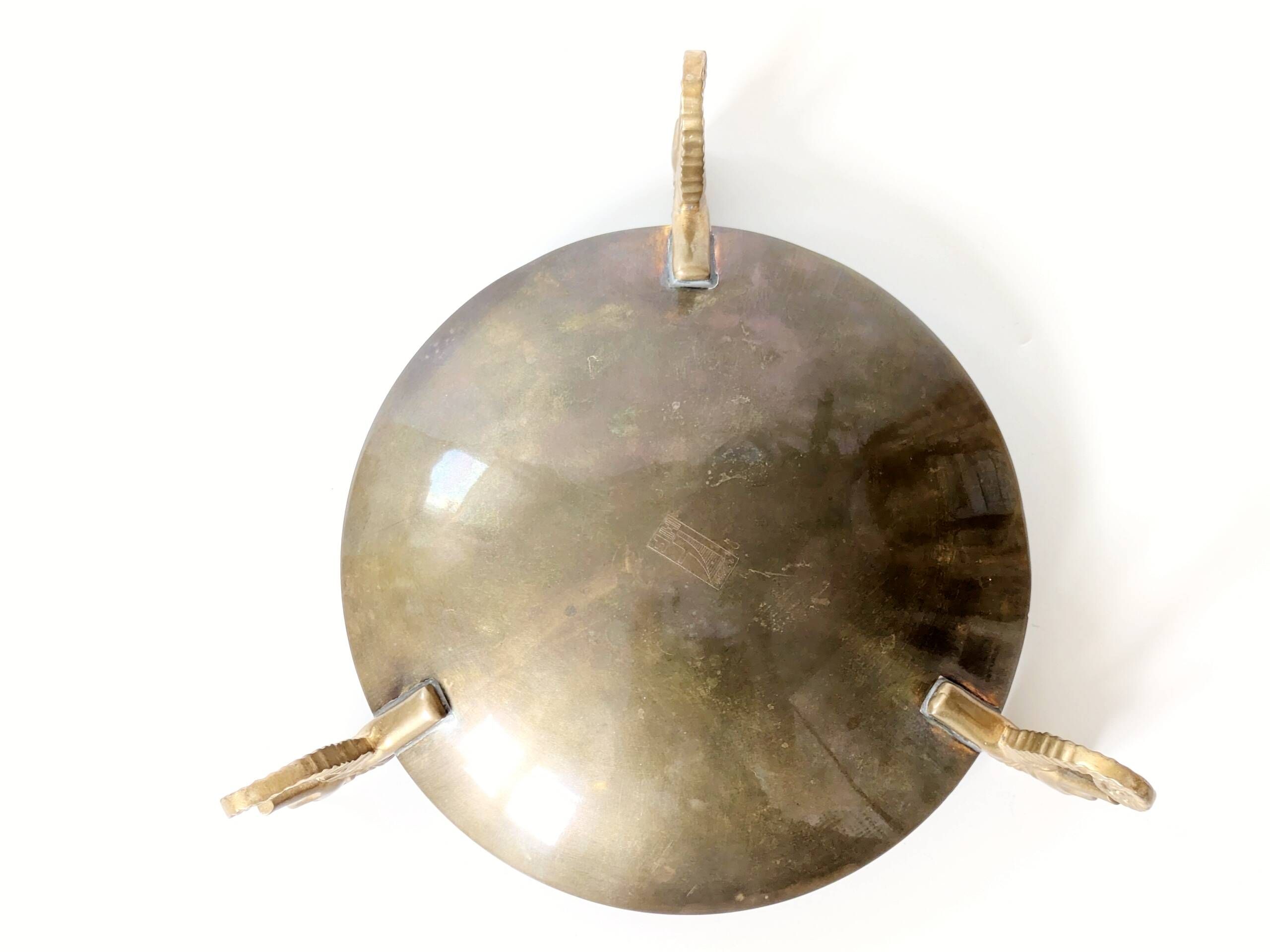 Vintage round brass tray on seahorse feet