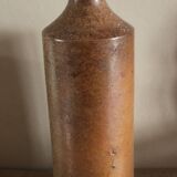 Vintage stoneware liqueur bottle with spout