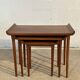 Set of three nesting low tables in a Japanese style, made of mahogany.