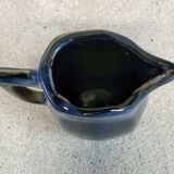 Blue glazed ceramic pitcher