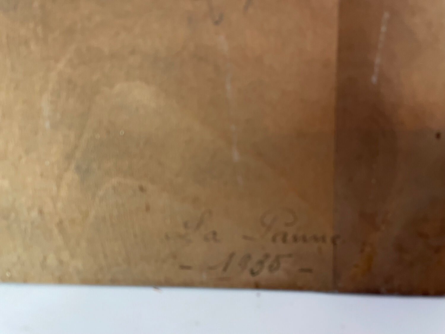 A pair of old paintings on wood.