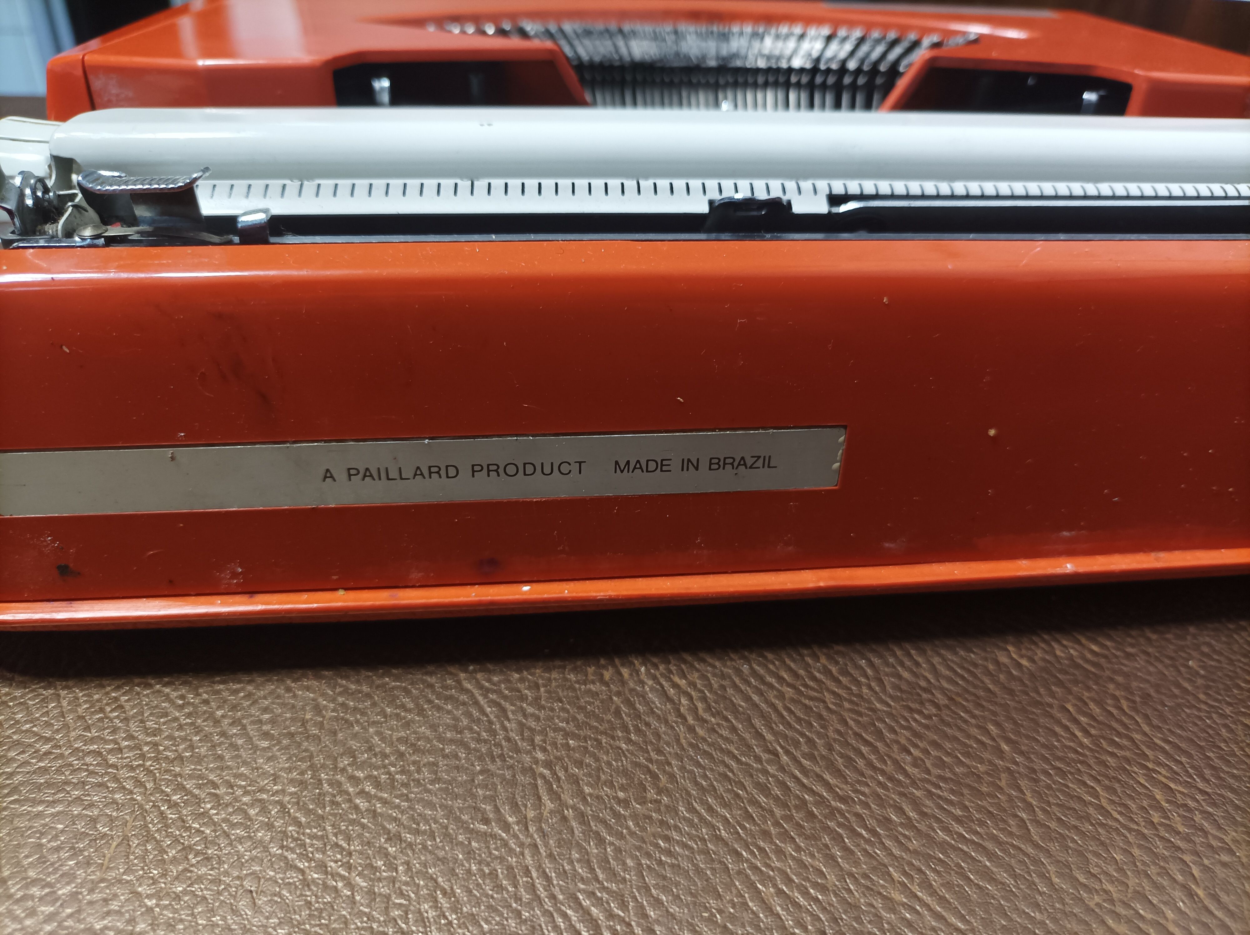 Hermes baby orange typewriter