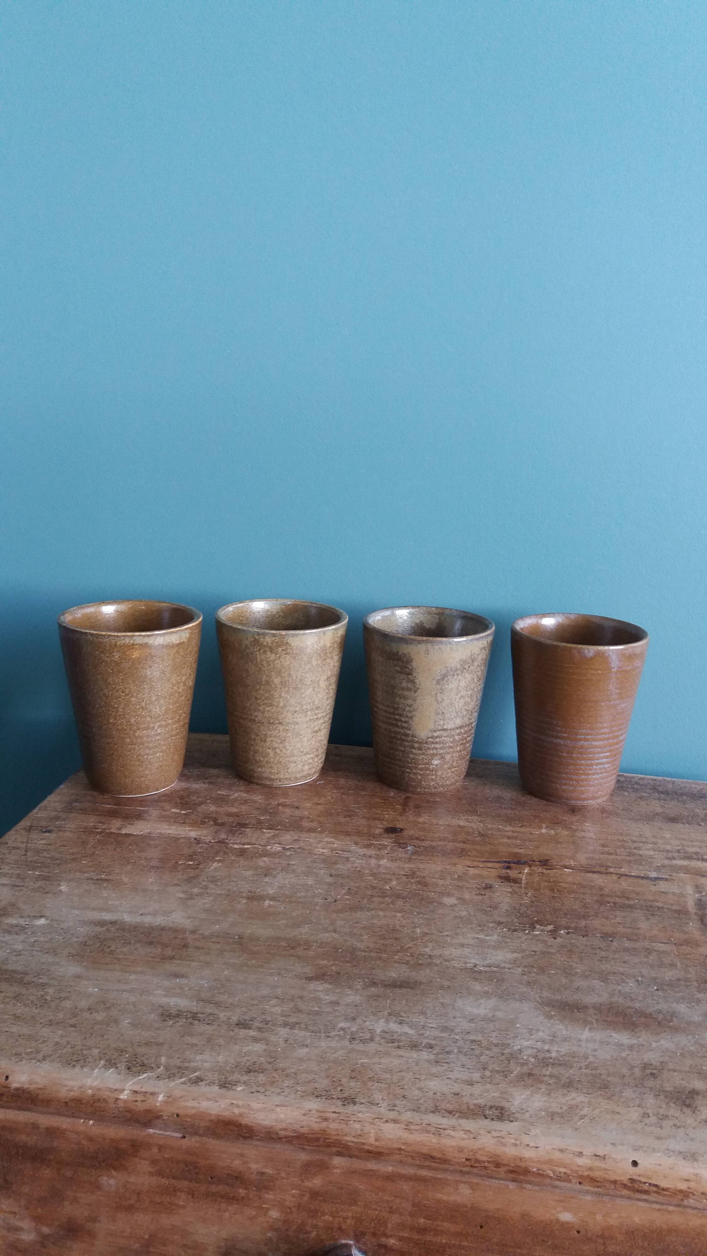Digoin stoneware mugs, glasses, and cups.