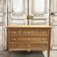 Commode Louis XVI en merisier clair vers 1970