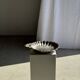Large antique silver-plated bowl in the shape of a shell.