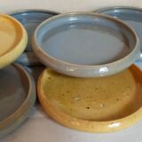 Seven vintage potter's sweet treat plates