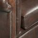 Set of a smooth chesterfield sofa and armchair with a timeless English look