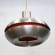 Old Danish space age design lamp in alu and orange inside.