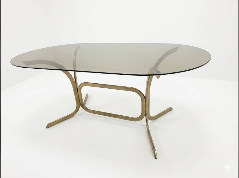 Silver metal table with smoked glass top from the 1970s.