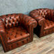 Pair of Chesterfield club armchairs in burgundy circa circa 1920 upholstered leather
