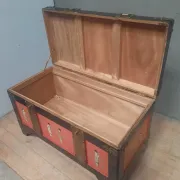 Red lacquered wooden mallet from the Far East.