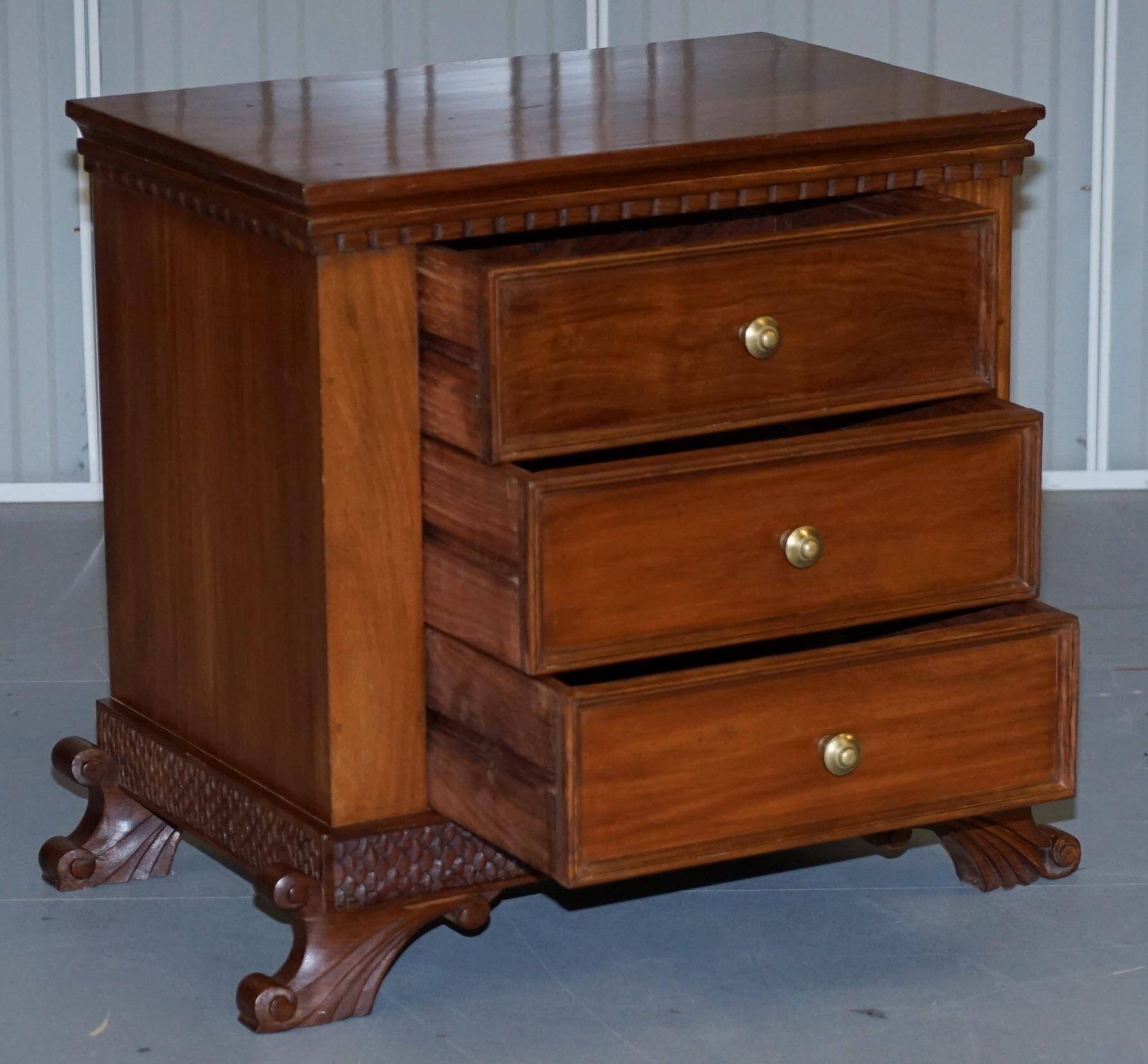 Set of hardwood dressers with finely carved bases.