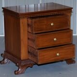 Set of hardwood dressers with finely carved bases.