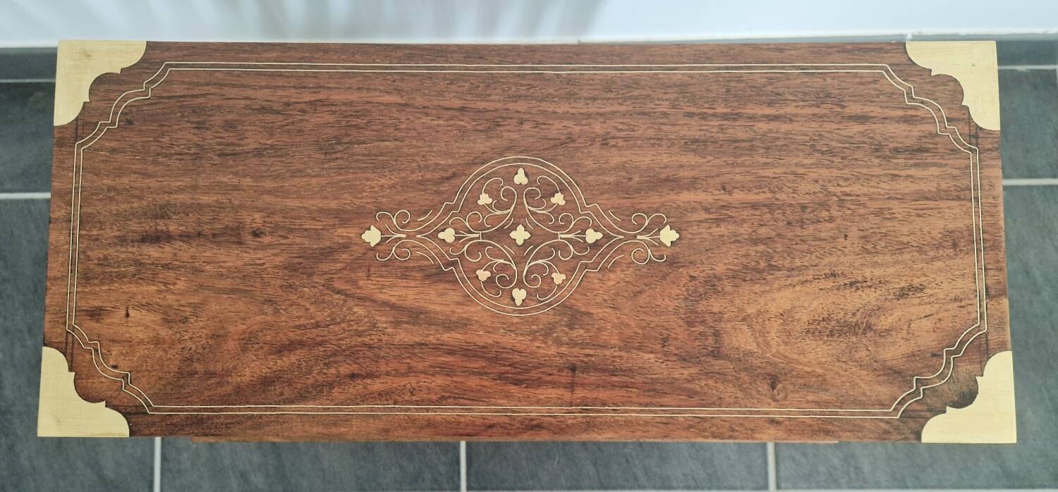 Rosewood and brass magazine stand table