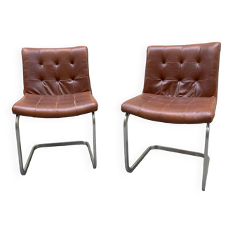 Pair of leather armchairs
