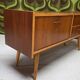 Small Scandinavian low sideboard 1960 vintage with tapered legs.