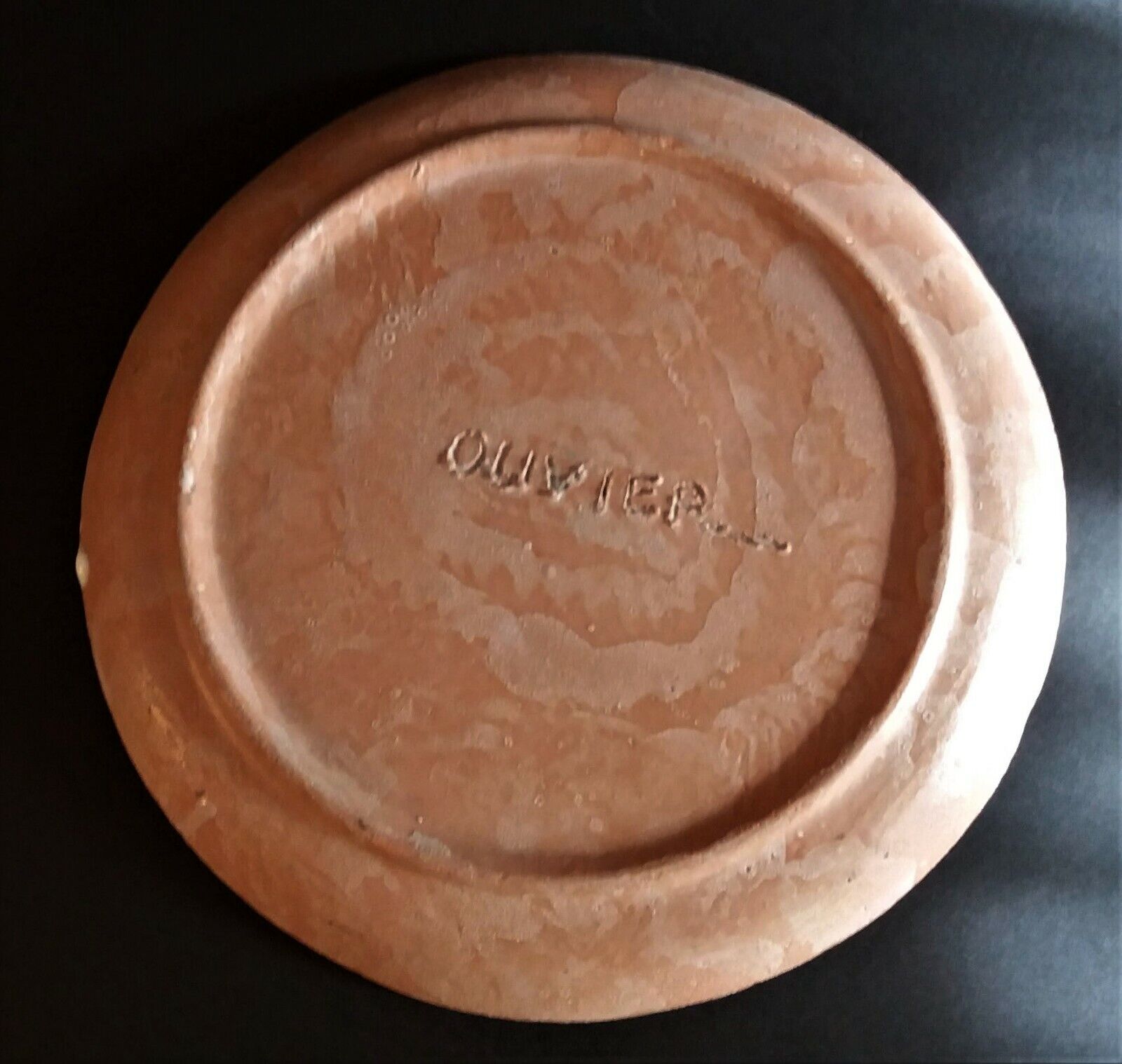 Vintage glazed terracotta ceramic plate signed Olivier