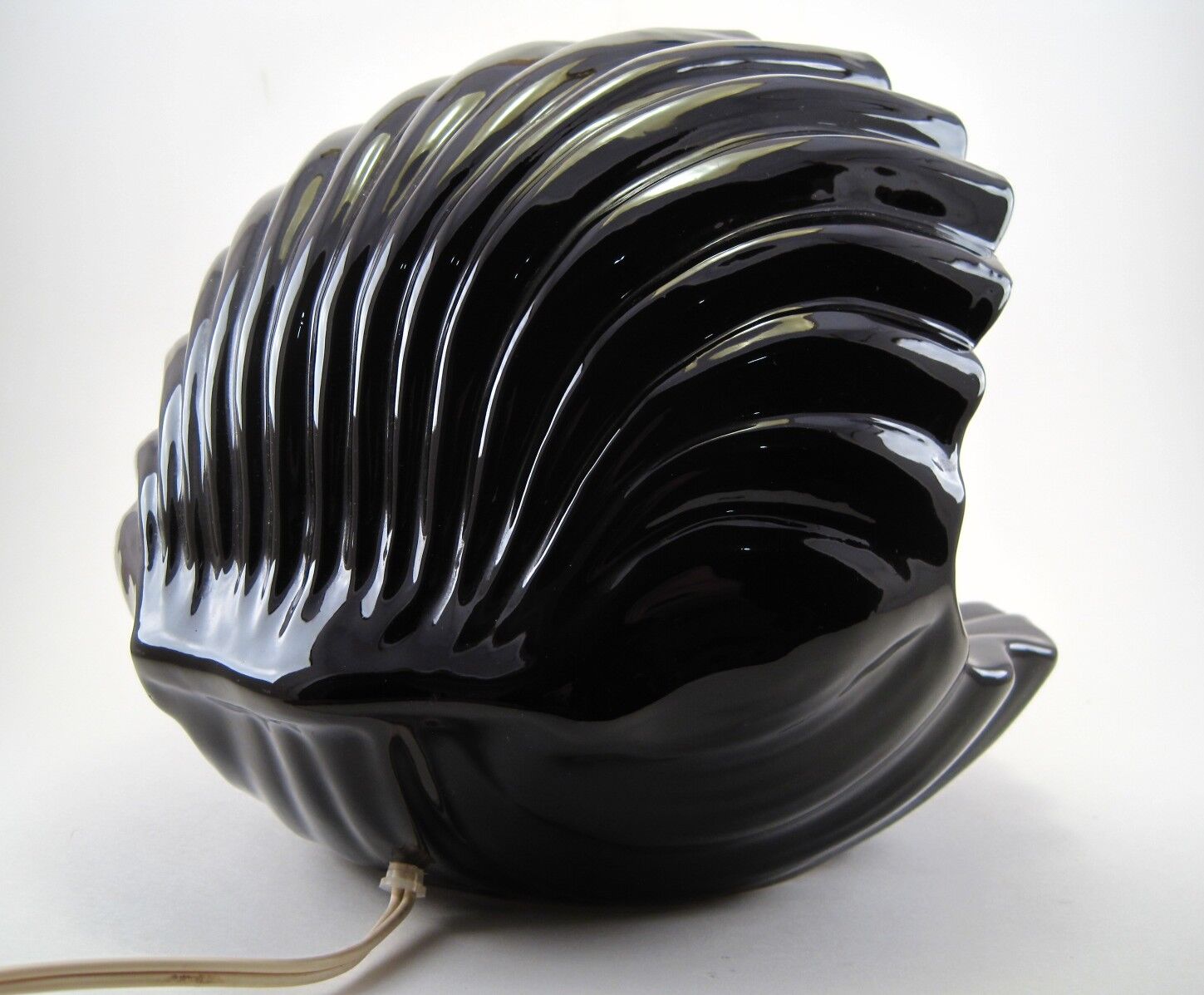 Vintage shell table lamp in black enamel ceramics design seventies 1970
