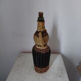 Anthropomorphic glass and rattan bottle 50s