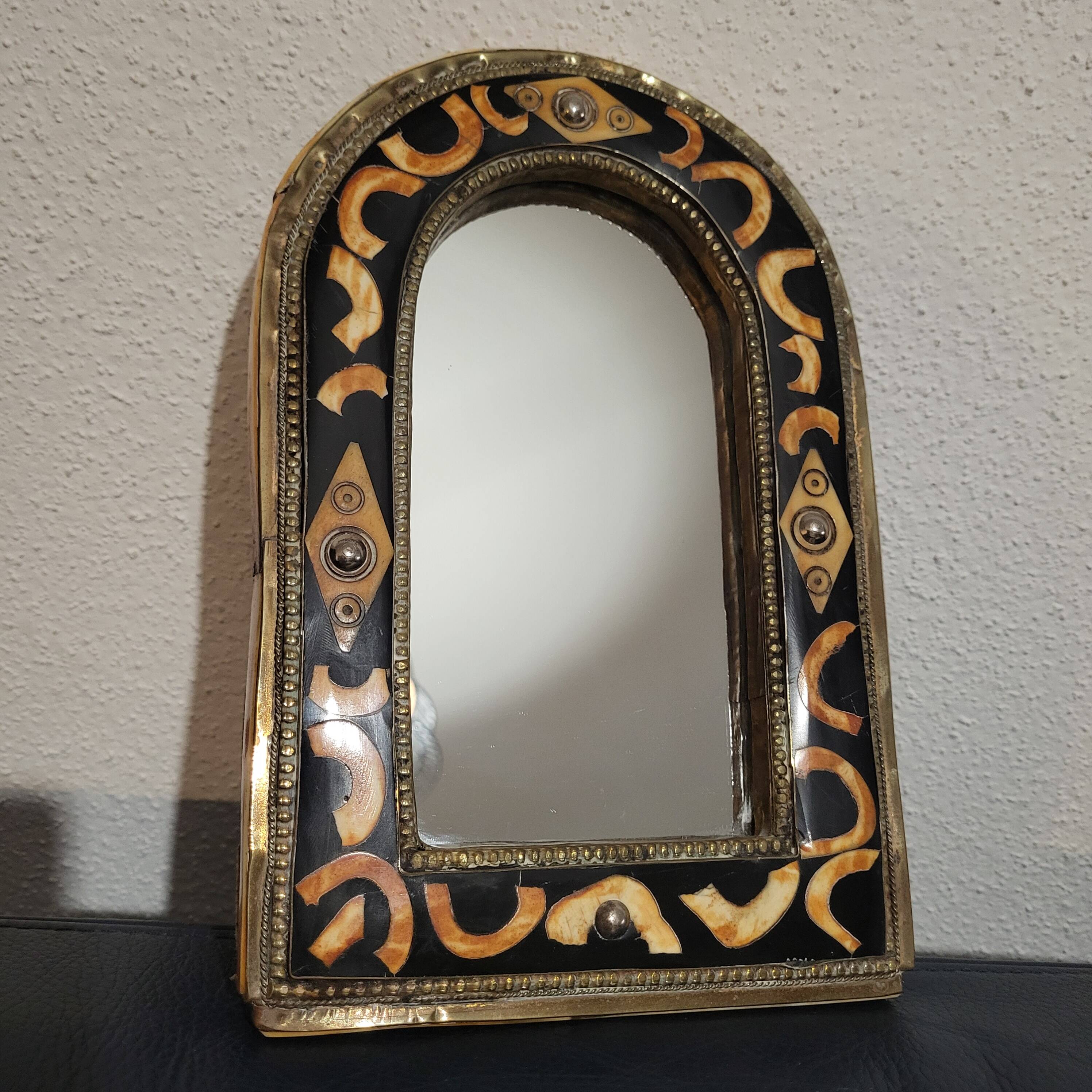 Oriental metal and bone mirror