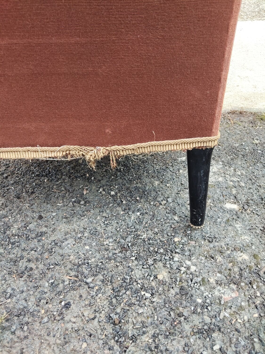 Antique brown velvet tub chair – turned legs and brass rings.