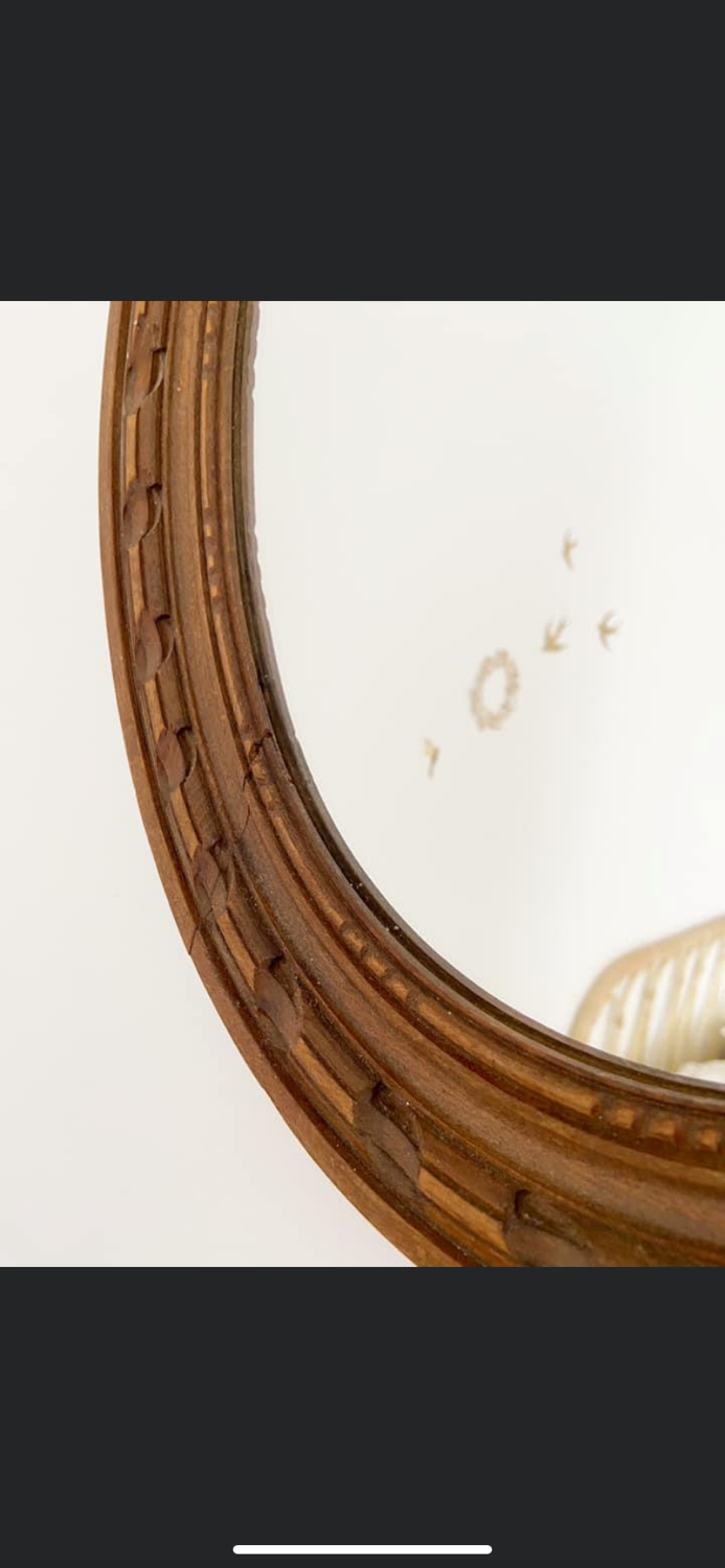 Louis XVI style oval knot mirror