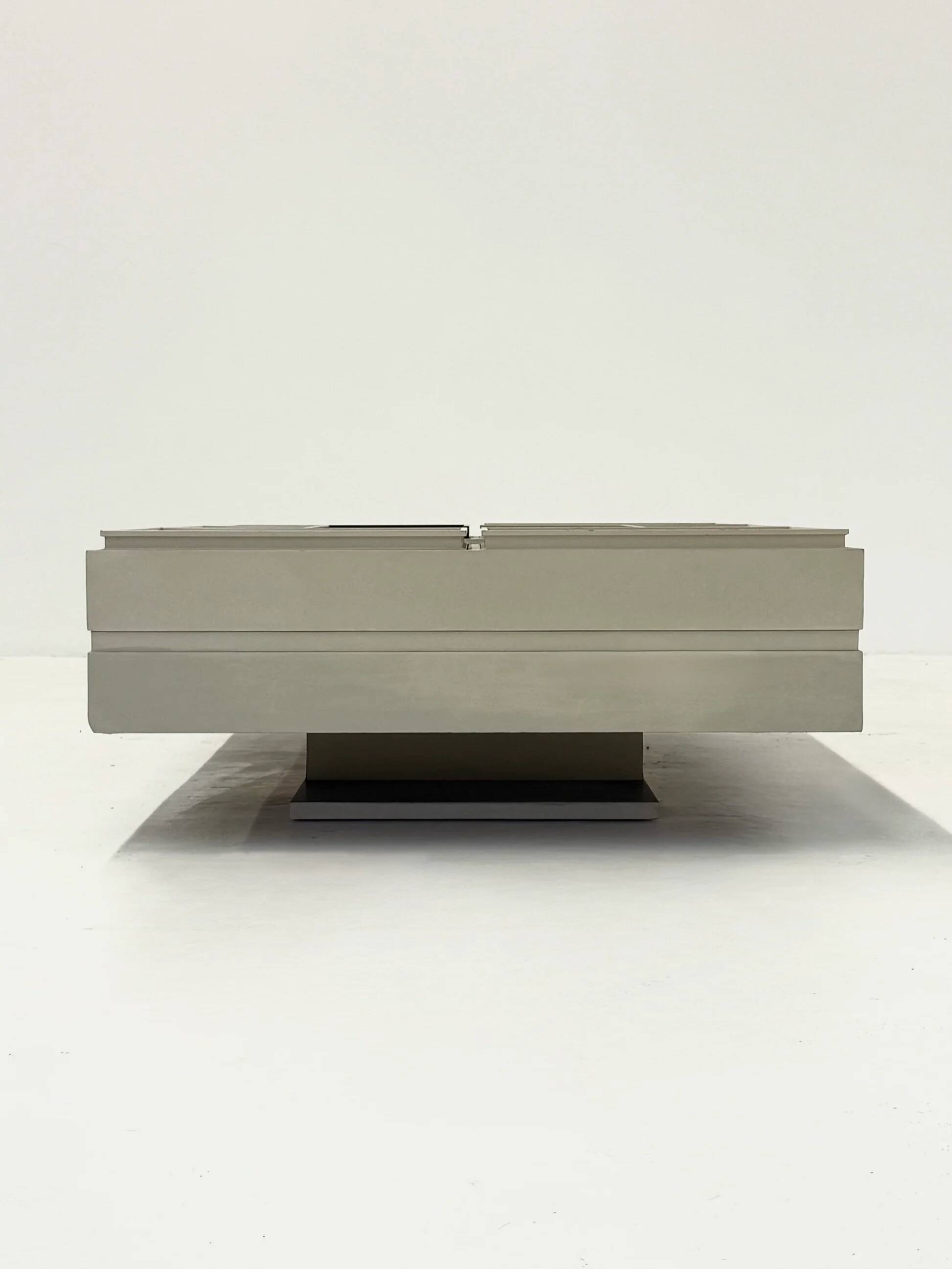 Modular white coffee table designed by Carlo Hauner for Forma