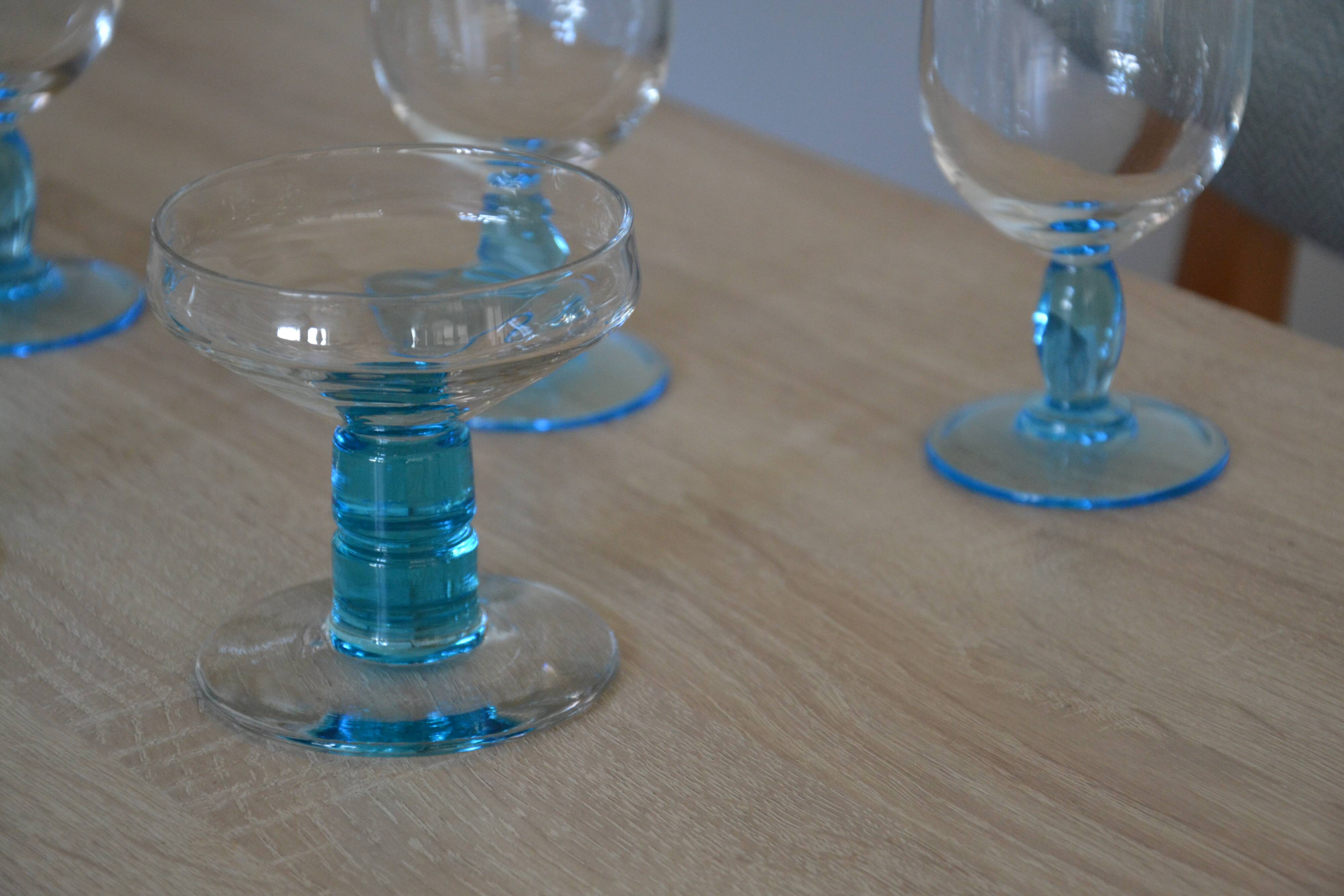 4 vintage blue footed champagne glasses