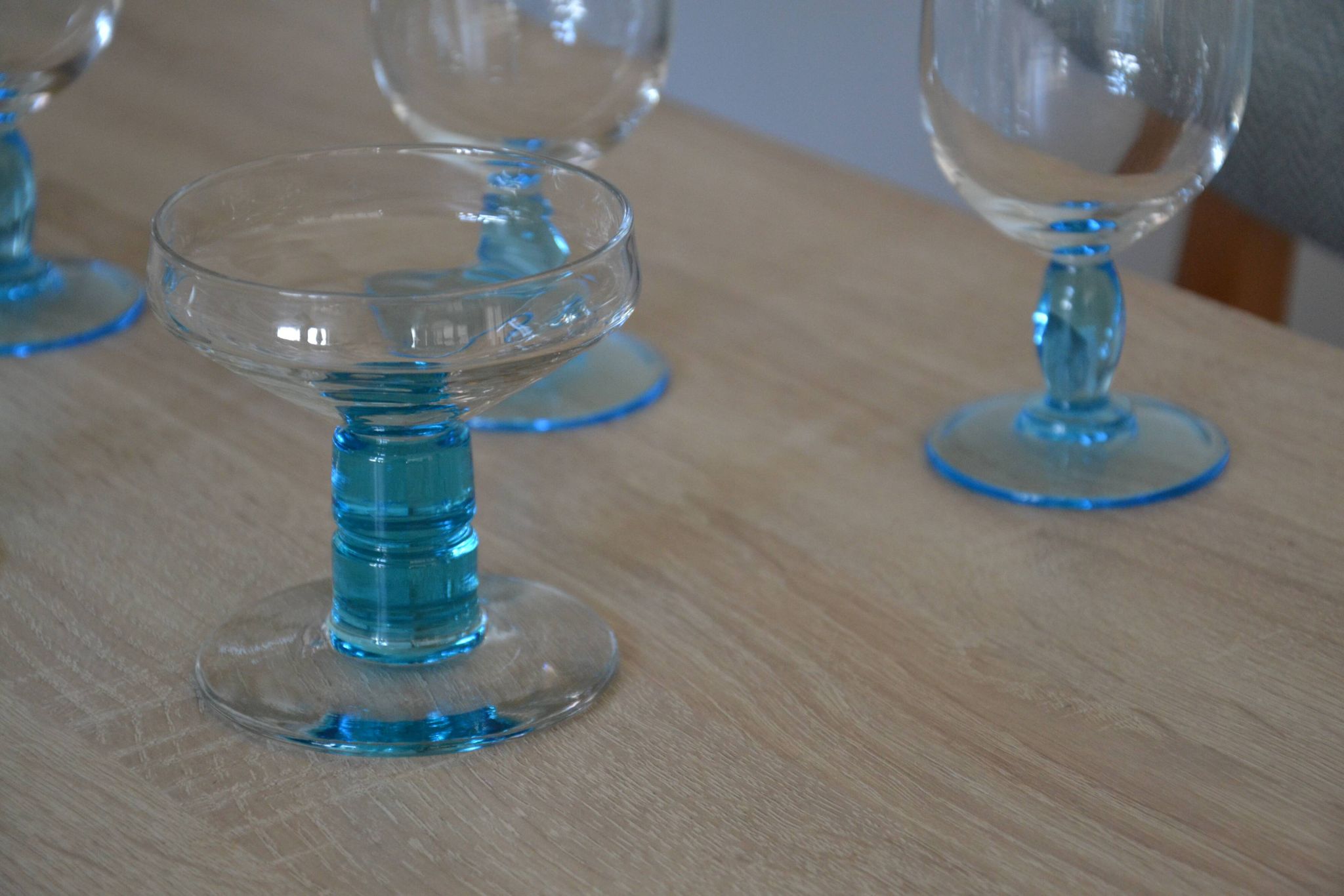 4 vintage blue footed champagne glasses