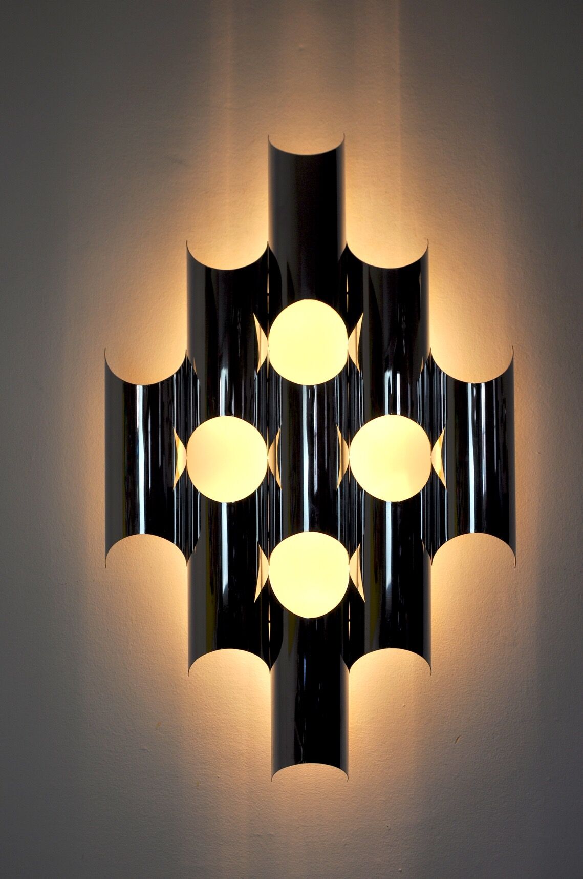 Space-age chrome wall lamp by RAAK, 8 lights, Germany, 1970