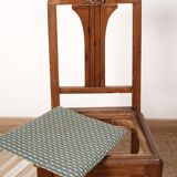 Set of 4 Art Deco chairs in carved wood.