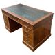 Antique English walnut chest of drawers from the 1930s.