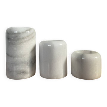 Vintage trio of candle holders in white marble.